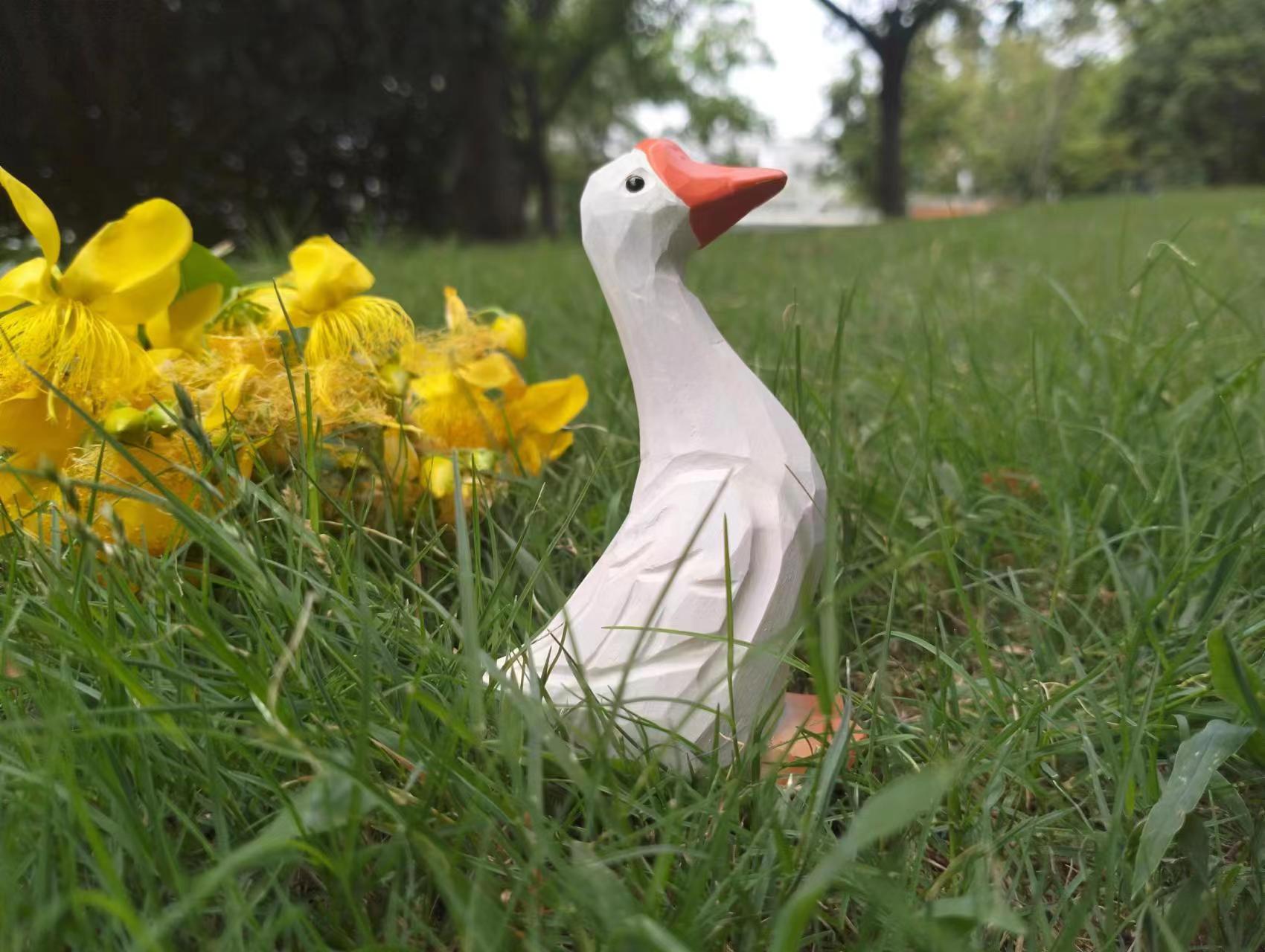 wooden goose sculpture