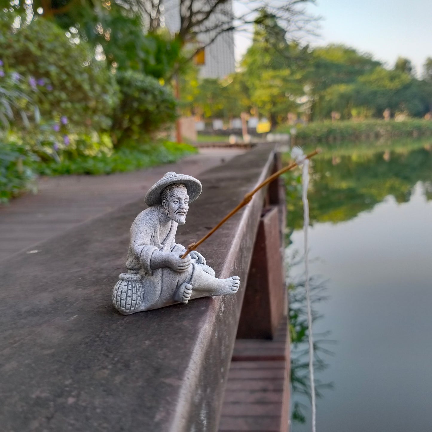 Vintage Fisherman Statue