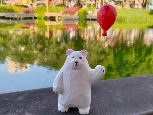 Polar Bear Figurine with Red Balloon